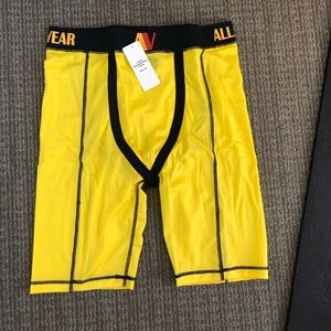 Yellow all valley compression shorts. New with tags. XL. 2 pairs.